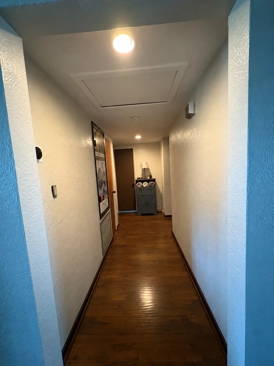 Hallway after painting with light neutral walls
